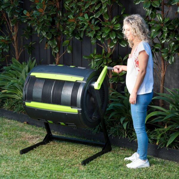 0438262fdf1244b099ba9776482a0861 65-Gallon Compost Tumbler And Cart Combo