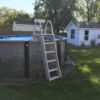 Confer Plastics 7200 Roll Guard 48′′ to 56′′ Adjustable A Frame Safety Ladder for Above Ground Outdoor Patio Swimming Pool Platform Ladder with Step Barrier, Warm Grey...