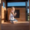 Backyard Discovery Canyon Creek Cedar Wood Swing Set with Wave Slide, Clubhouse, Play Kitchen, Picnic Area, Belt Swings, Web Swing, Rock Wall, Balconies, Playhouse, Step Ladder, Outdoor Playset