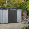 Keter Artisan 11×7 Modern Resin Outdoor Storage Shed Kit-Perfect to Store Patio Furniture, Garden Tools Bike Accessories, Beach Chairs and Lawn Mower, Grey & Black