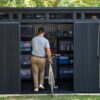 Keter Artisan 11×7 Modern Resin Outdoor Storage Shed Kit-Perfect to Store Patio Furniture, Garden Tools Bike Accessories, Beach Chairs and Lawn Mower, Grey & Black